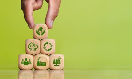Environmental concepts on ESG, environment, carbon, recycling, society, industry and solar energy. sustainable natural energy Green icon on a wooden block. Copy space